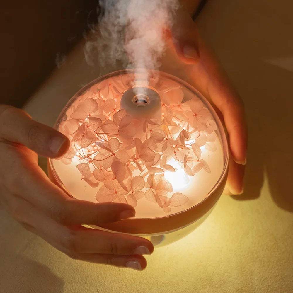 270ML Flower Air HumidifierElevate your living space with the 270ML Flower Air Humidifier, a perfect blend of functionality and elegance. This USB rechargeable humidifier, powered by an 800mAh1724270ML Flower Air Humidifier