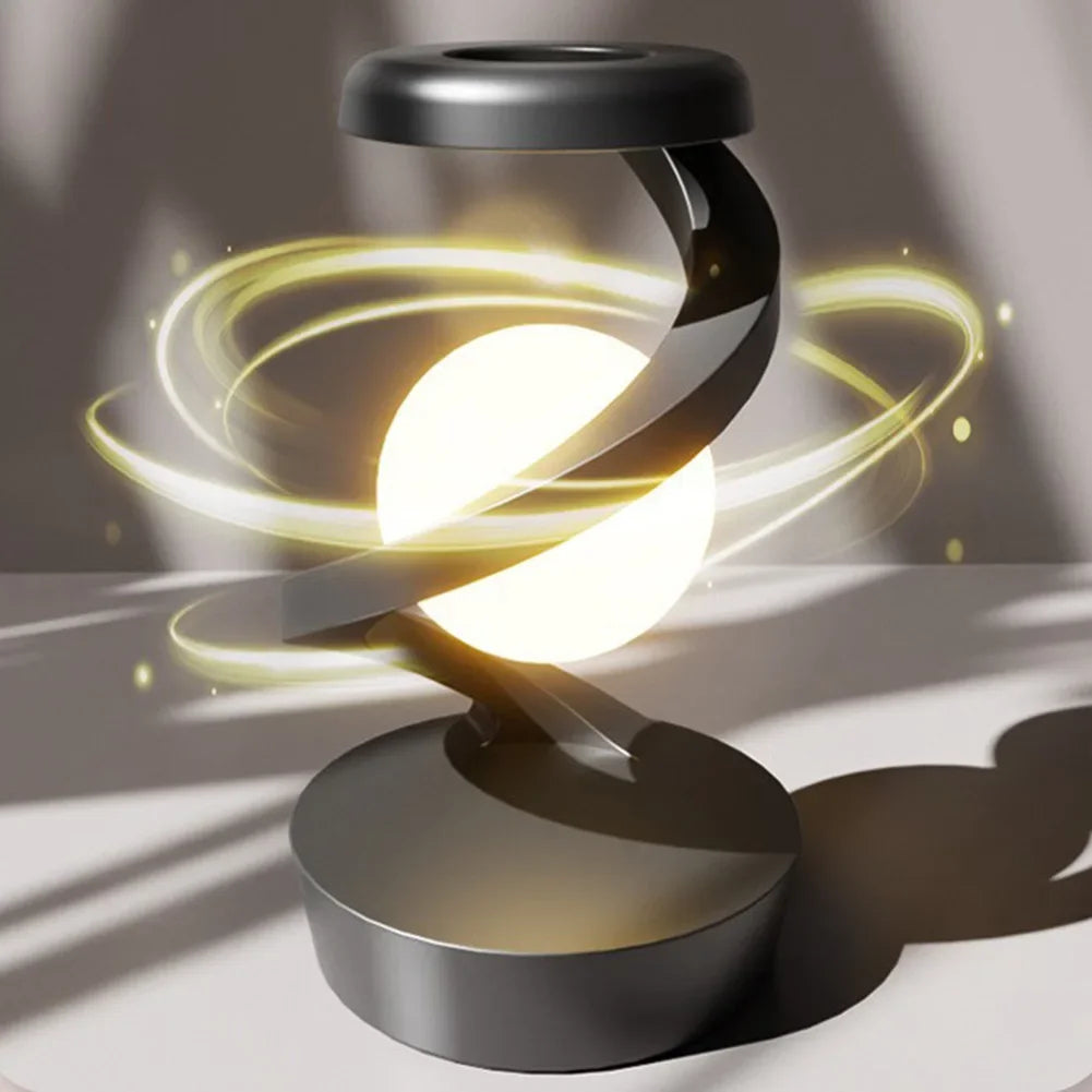 Levitating Ball Lamp with Wireless ChargerTransform your space with the mesmerizing Levitating Ball Lamp with Wireless Charger, designed to captivate and elevate any environment. This 3D LED moon-like ball f1724Levitating Ball Lamp