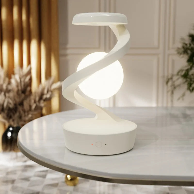 Levitating Ball Lamp with Wireless ChargerTransform your space with the mesmerizing Levitating Ball Lamp with Wireless Charger, designed to captivate and elevate any environment. This 3D LED moon-like ball f1724Levitating Ball Lamp