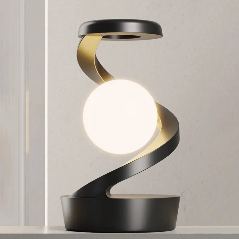 Levitating Ball Lamp with Wireless ChargerTransform your space with the mesmerizing Levitating Ball Lamp with Wireless Charger, designed to captivate and elevate any environment. This 3D LED moon-like ball f1724Levitating Ball Lamp