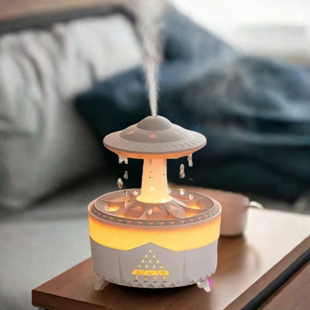 Rain Drop Air Humidifier Essential Oil DiffuserThe Rain Drop Air Humidifier Essential Oil Diffuser, with its 350ml capacity, unique rain cloud design, and multifunctionality, is a must-have for those seeking a pe1724Rain Drop Air Humidifier Essential Oil Diffuser